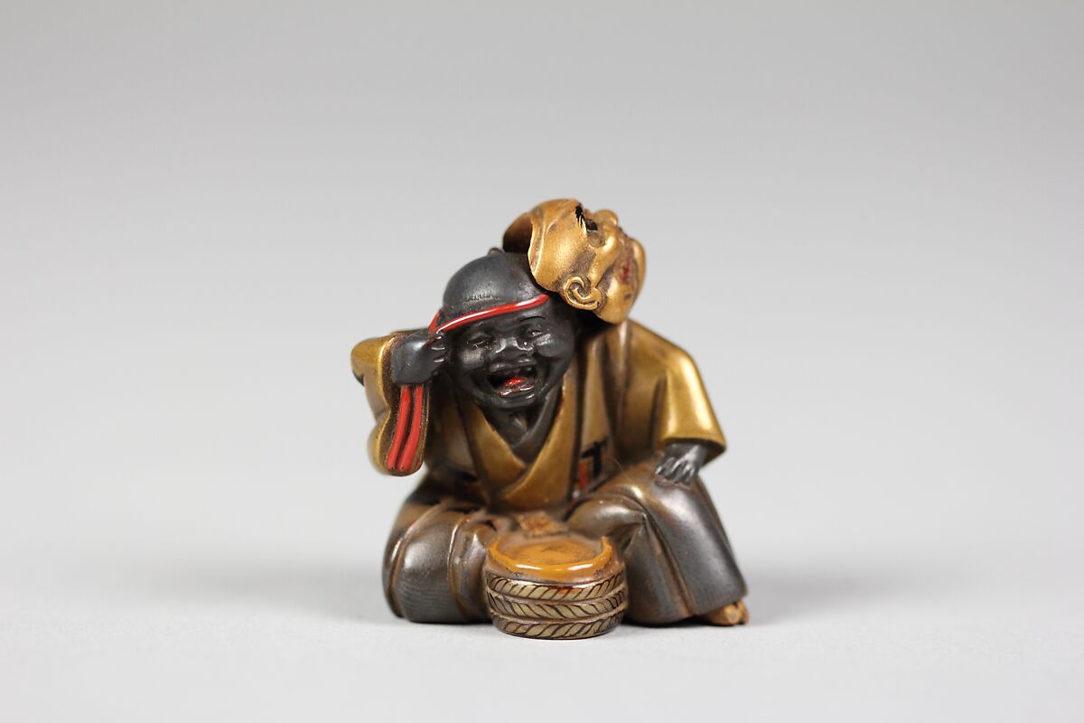 Netsuke of Boy with a Mask, Lacquer, Japan 