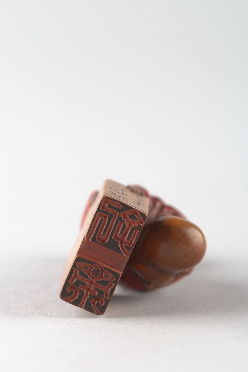 Netsuke and Seal, Wood; red lacquer, Japan