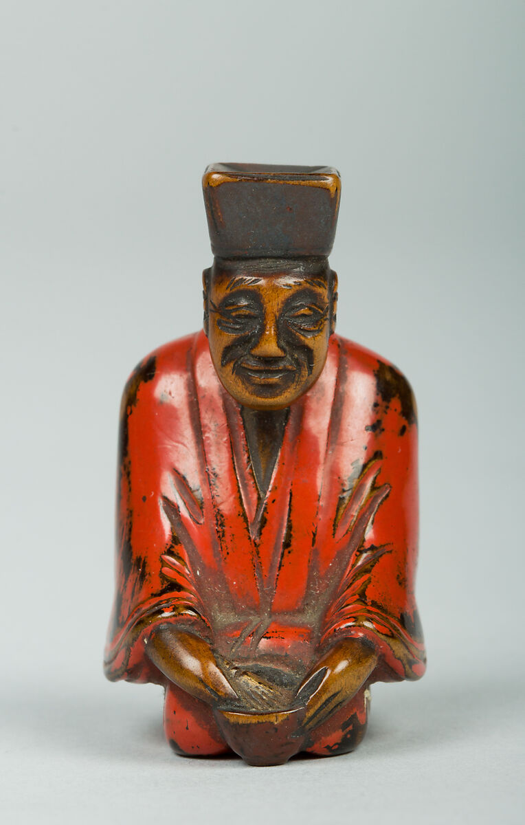 Netsuke of Tea Master, Wood and red lacquer, Japan 