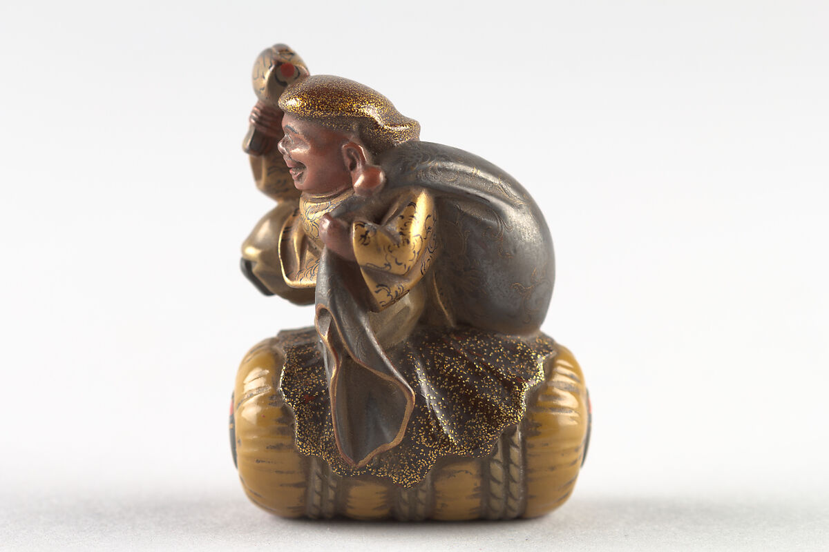 Netsuke of Daikoku and Bag on Rice Bale, Wood, Japan
