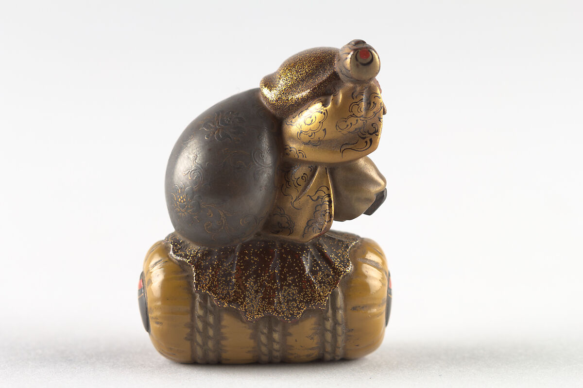 Netsuke of Daikoku and Bag on Rice Bale, Wood, Japan