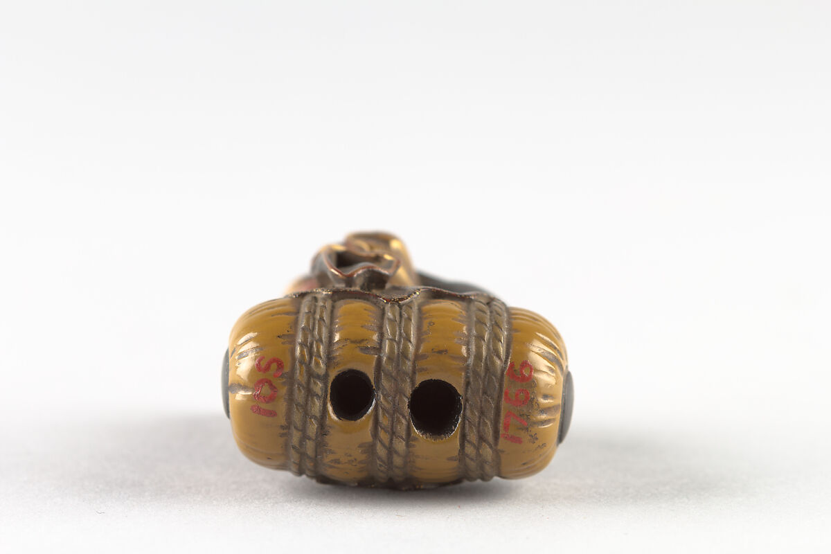 Netsuke of Daikoku and Bag on Rice Bale, Wood, Japan