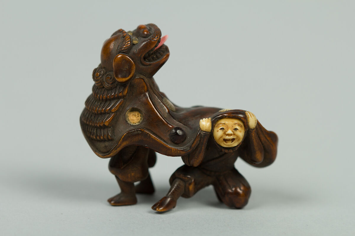 Netsuke, Wood inlaid with ivory, Japan 