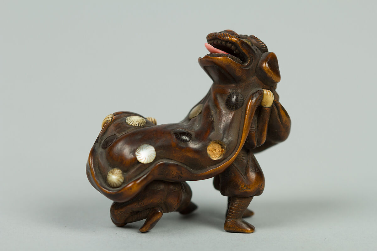 Netsuke, Wood inlaid with ivory, Japan