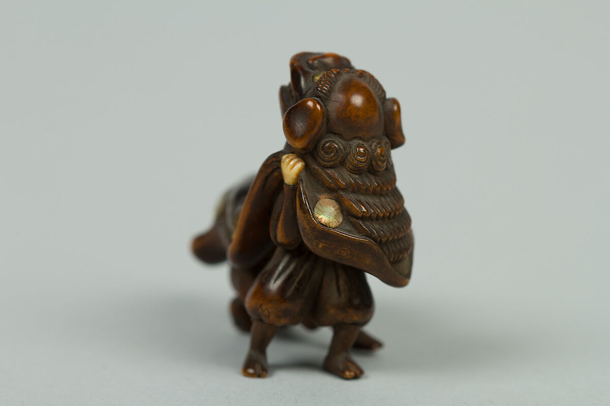 Netsuke, Wood inlaid with ivory, Japan