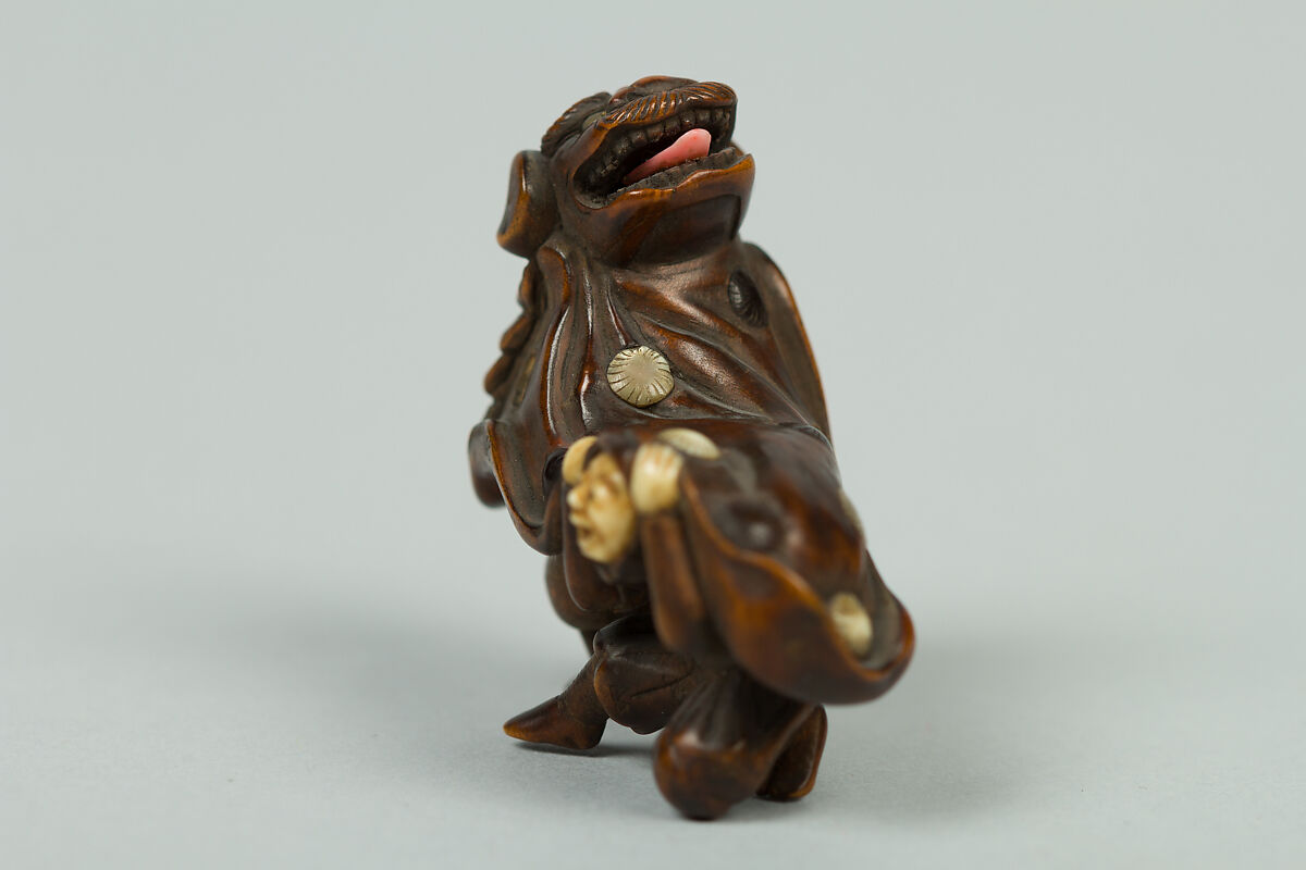 Netsuke, Wood inlaid with ivory, Japan