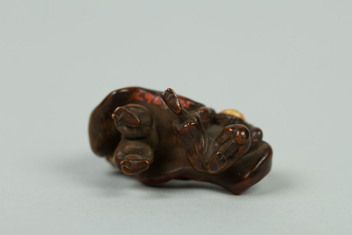 Netsuke, Wood inlaid with ivory, Japan