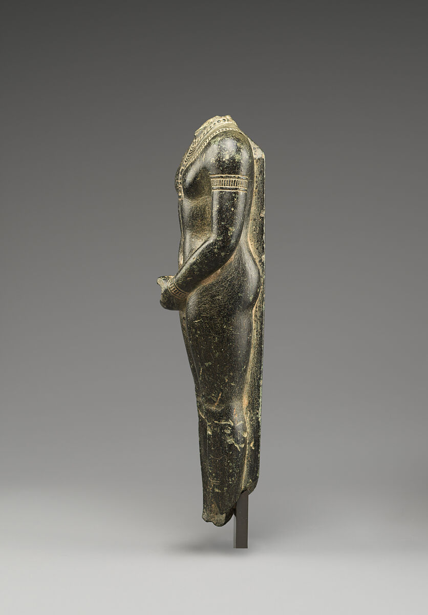 Headless unshrouded ithyphallic deity statuette, Serpentinite