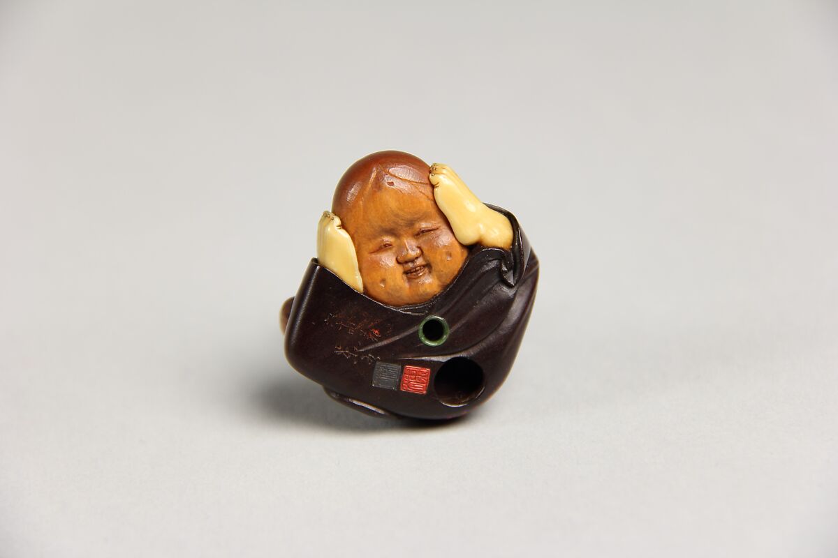 Netsuke of Mask Maker, Wood and ivory, Japan