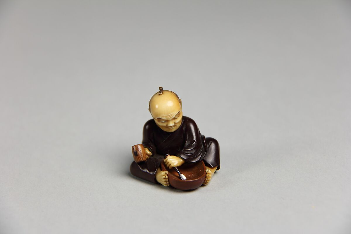 Netsuke of Mask Maker, Wood and ivory, Japan 