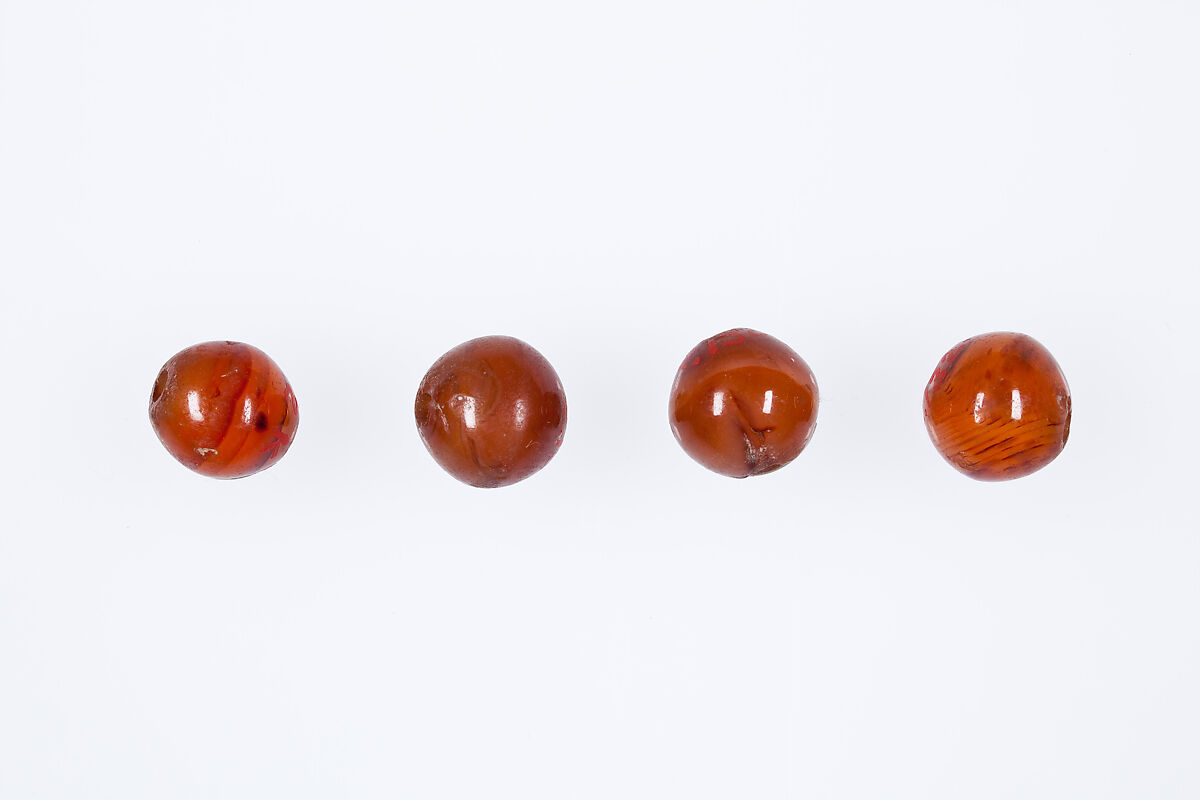 Round beads from the mummy of Ukhhotep, Carnelian 