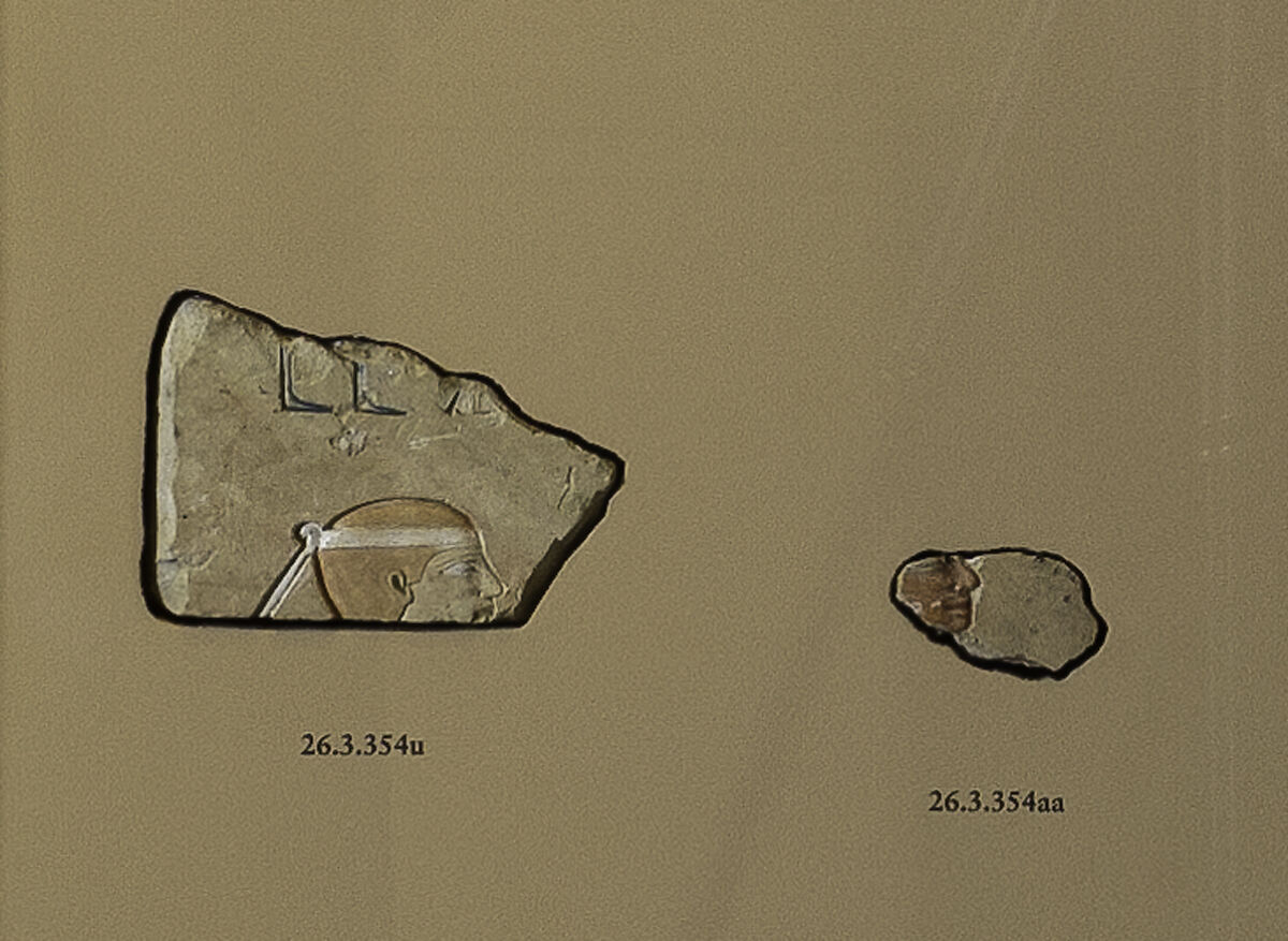 Faces of a man and woman, from marsh hunting scene (?), Limestone, paint 