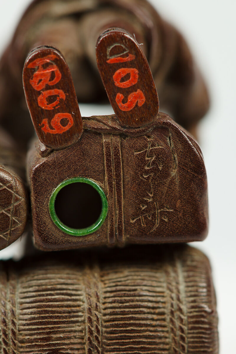 Netsuke of Artist Marking a Box, Wood, Japan