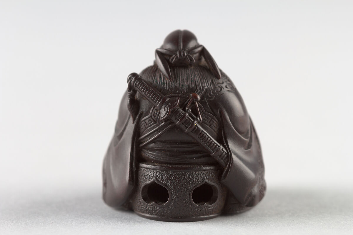 Netsuke of Man with a Demon on a Chain, Wood, Japan