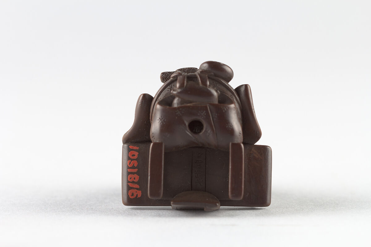 Netsuke of Young Boy at Writing Desk, Dreaming, Wood, Japan