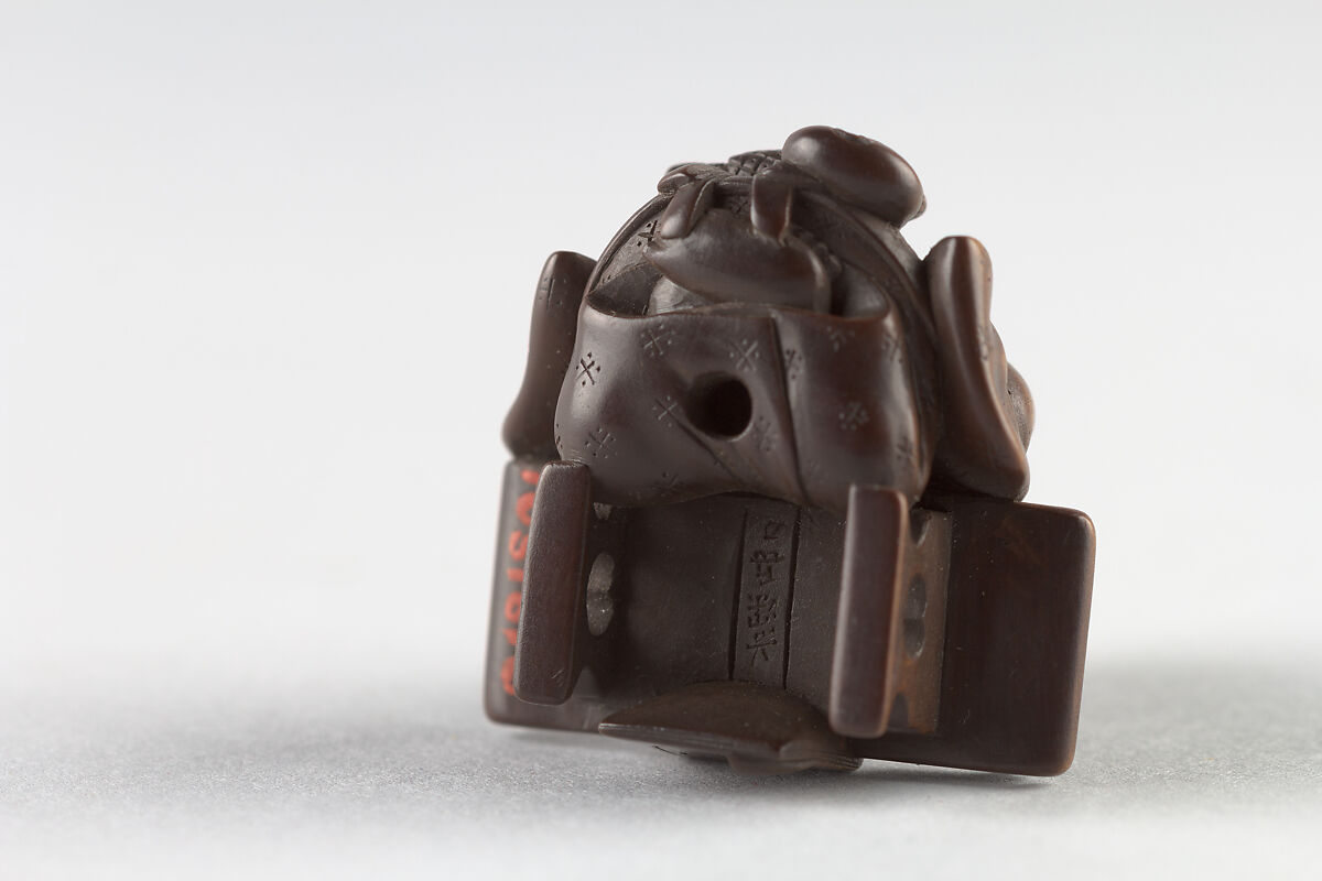 Netsuke of Young Boy at Writing Desk, Dreaming, Wood, Japan