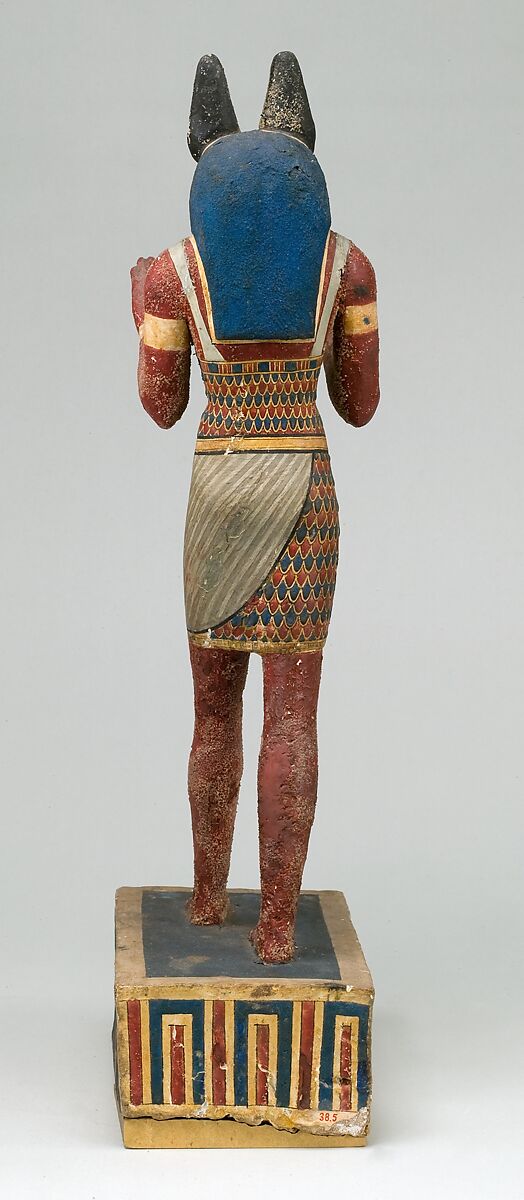 Statuette of a canid-headed god, probably Anubis, Plastered and painted wood