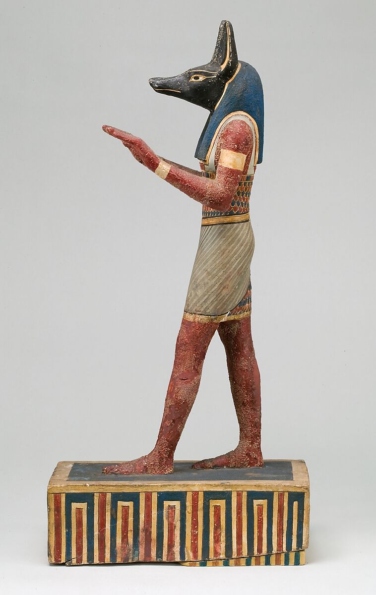 Statuette of a canid-headed god, probably Anubis, Plastered and painted wood
