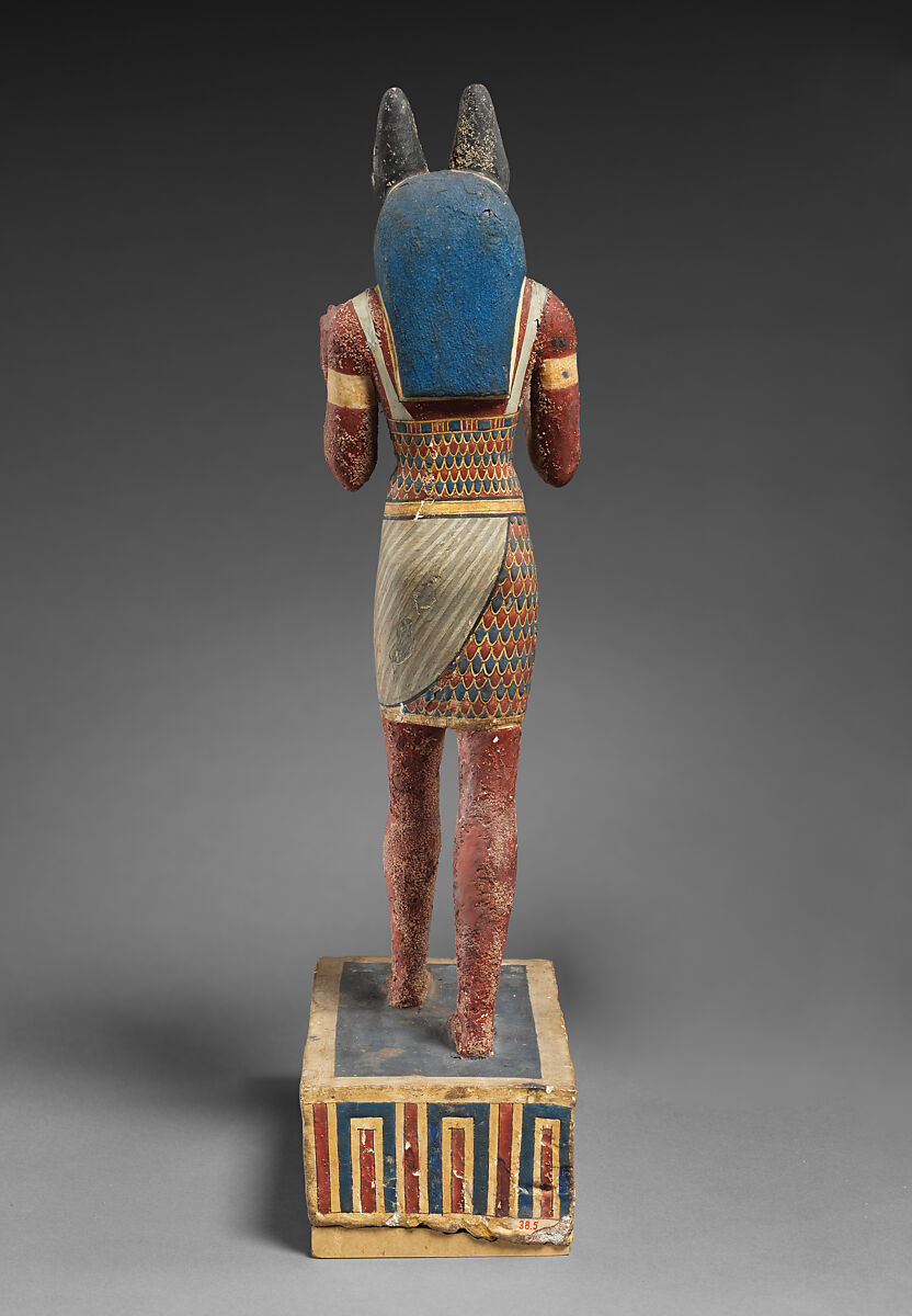 Statuette of a canid-headed god, probably Anubis, Plastered and painted wood