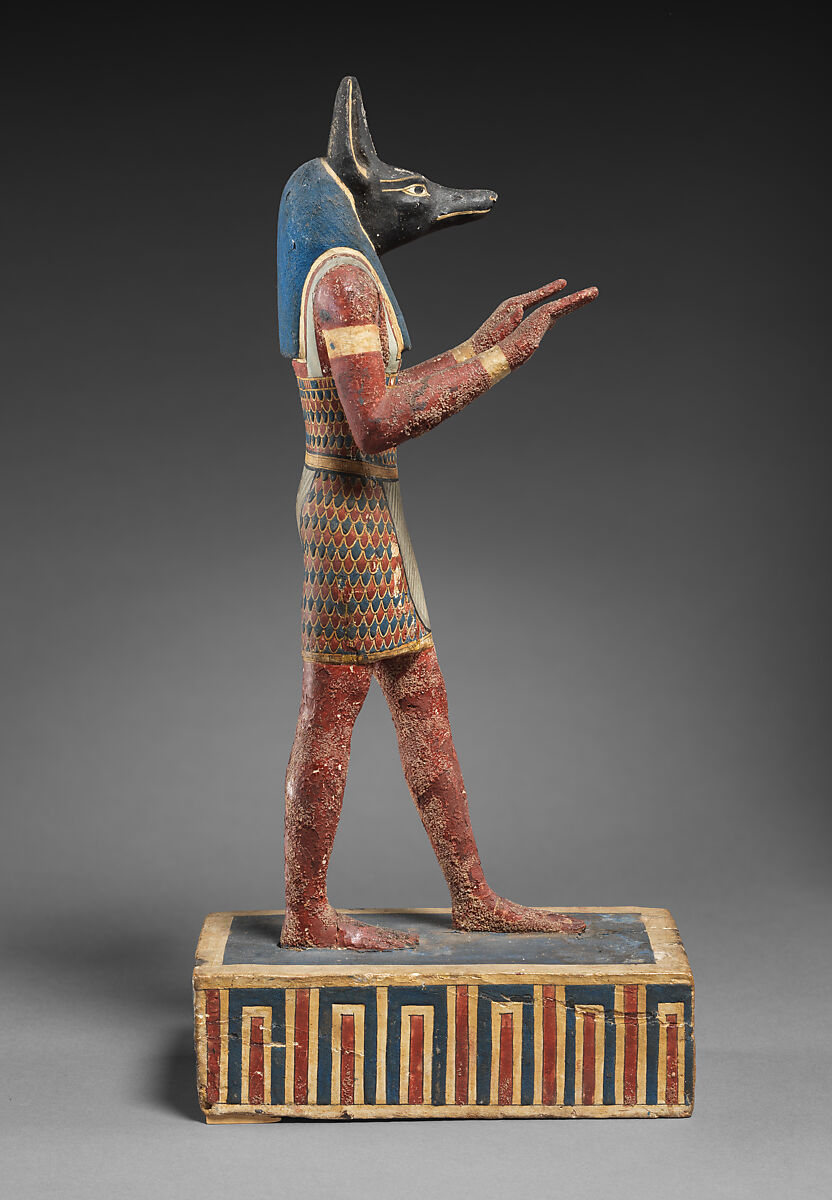 Statuette of a canid-headed god, probably Anubis, Plastered and painted wood