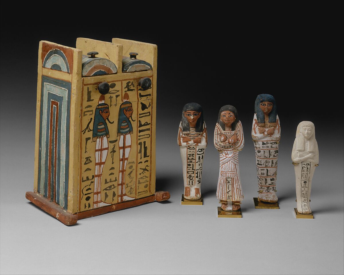 Shabti box and shabtis of members of the Sennedjem family, Painted wood, limestone, and ink 