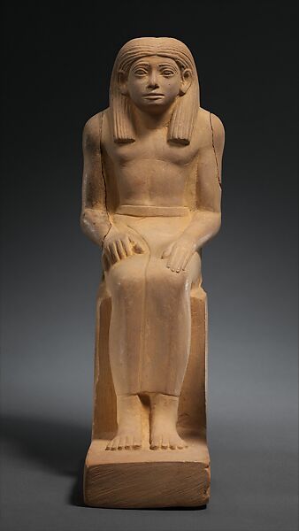 Statuette of a Seated Man, Yellowish limestone 