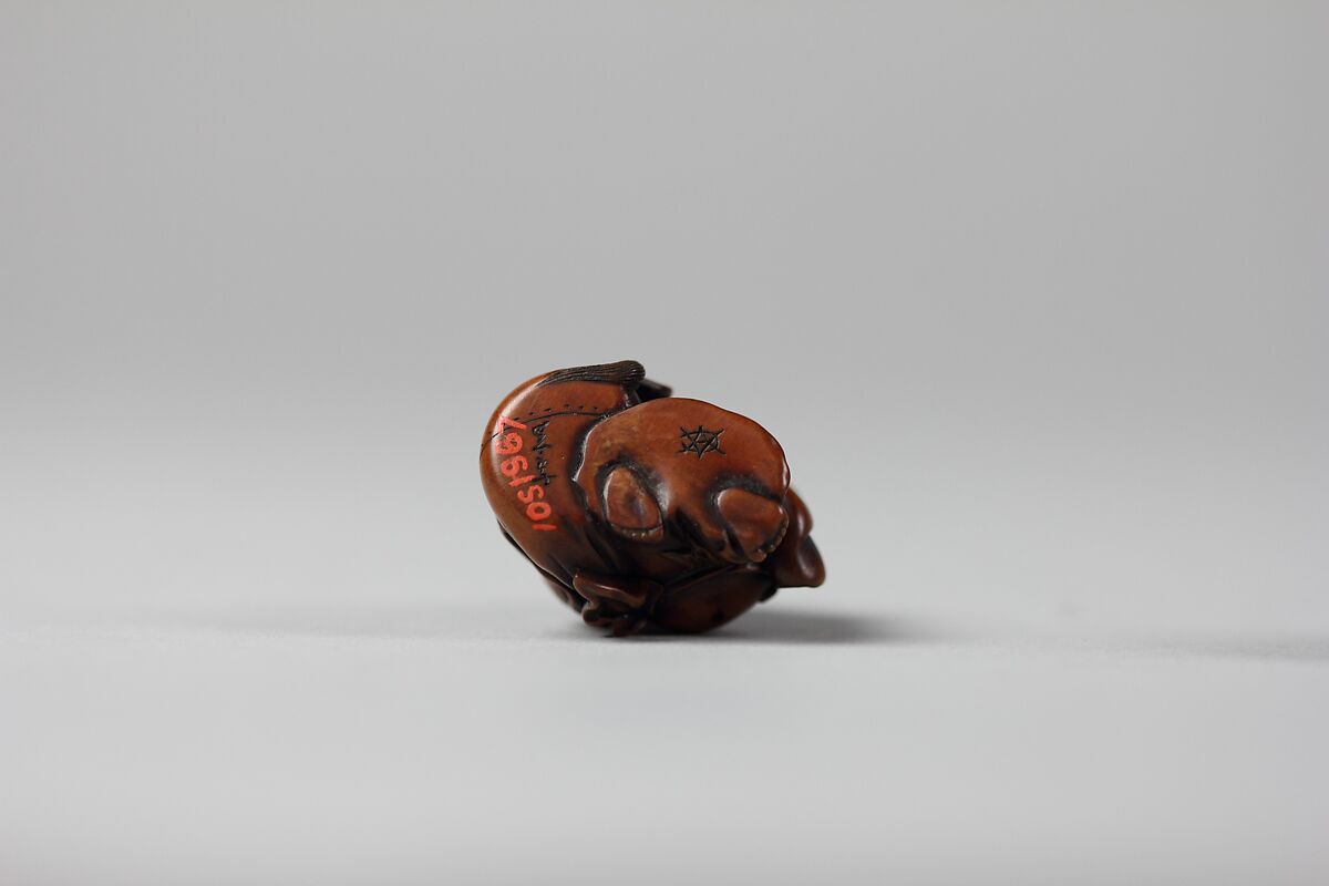 Netsuke of Hotei and Bag with Fan, Wood, Japan