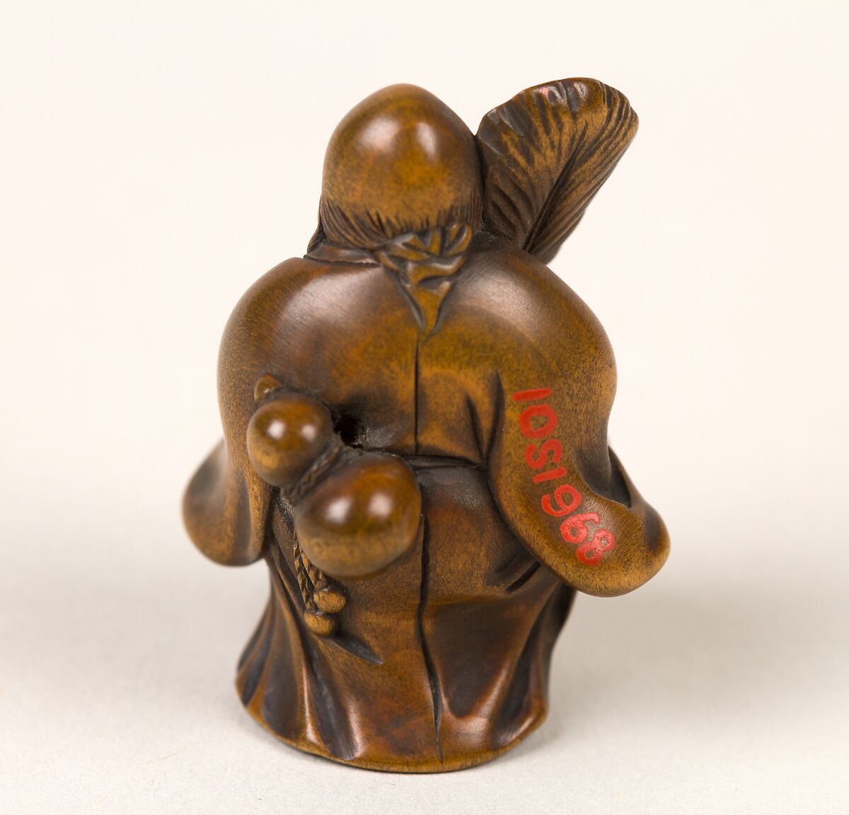 Netsuke of Old Man with a Fan, Wood, Japan