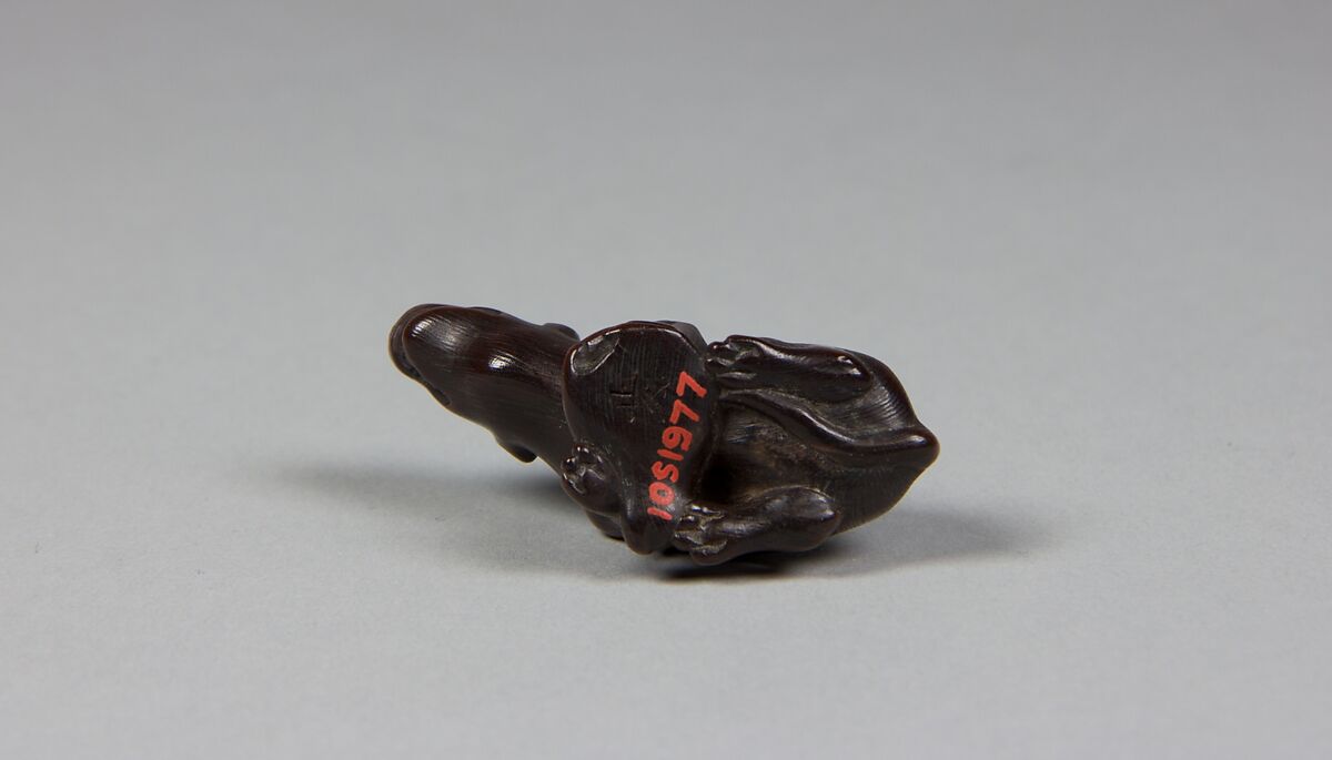 Netsuke of a Wolf, Wood; glass eyes, Japan