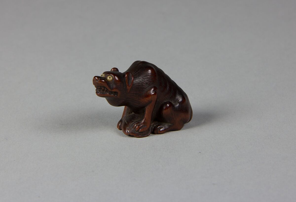 Netsuke of a Wolf, Wood; glass eyes, Japan