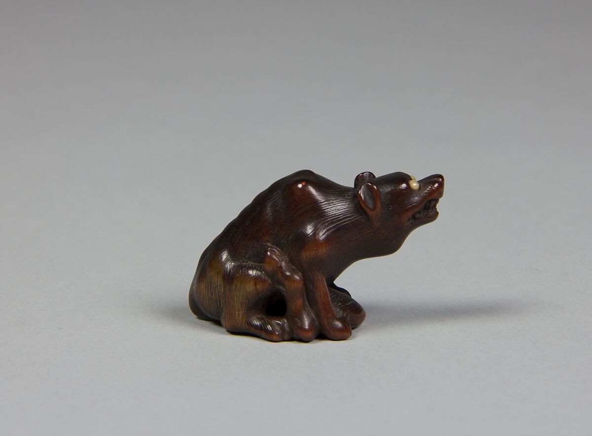 Netsuke of a Wolf, Wood; glass eyes, Japan 