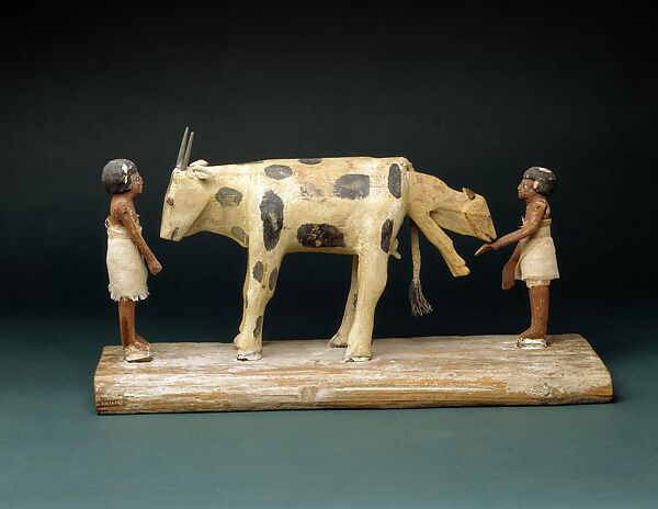 Model of a Cow Giving Birth, Wood, paint 