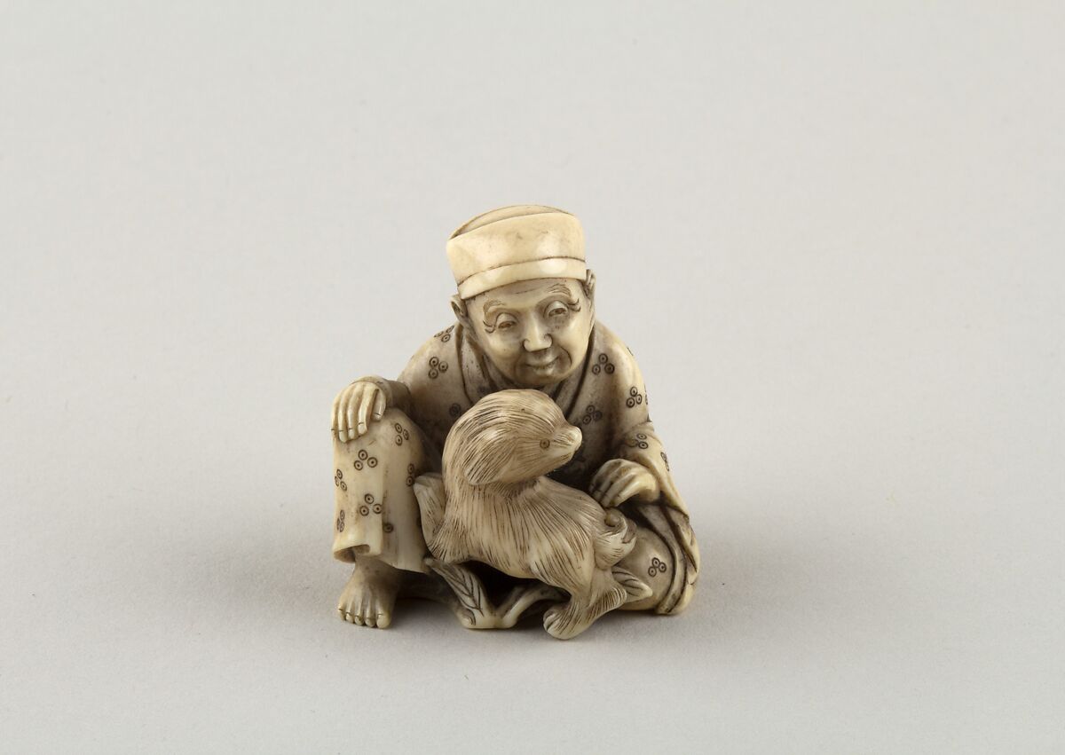 Seated figure of a Man with Dog, Ivory, Japan 