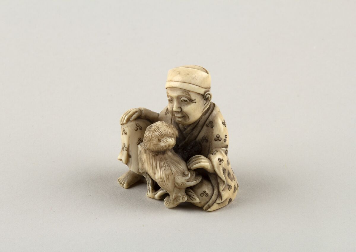 Seated figure of a Man with Dog, Ivory, Japan