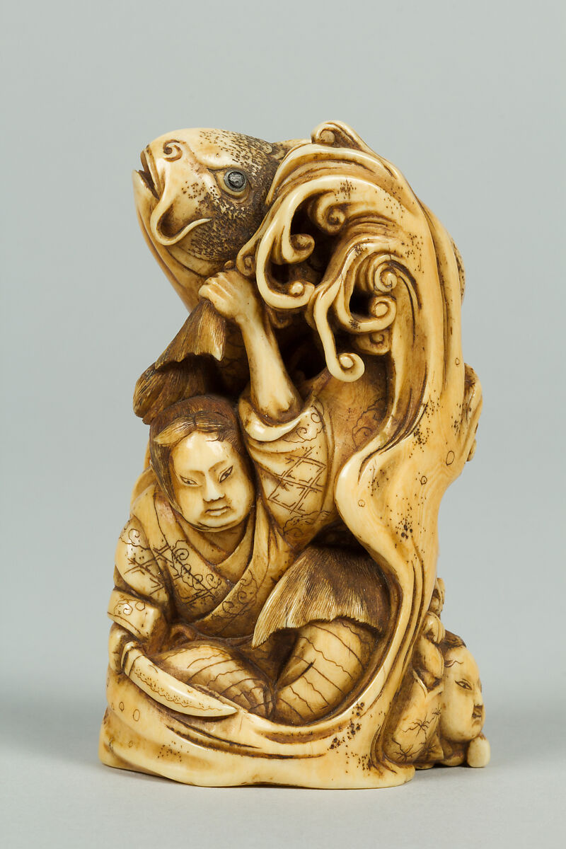 Netsuke of Group of men in the Water holding a Large Carp, Ivory, Japan 
