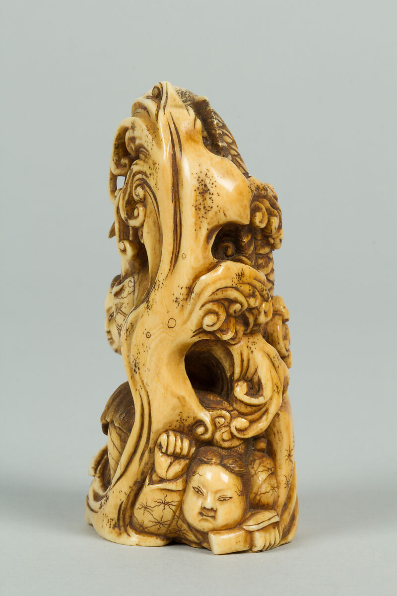 Netsuke of Group of men in the Water holding a Large Carp, Ivory, Japan