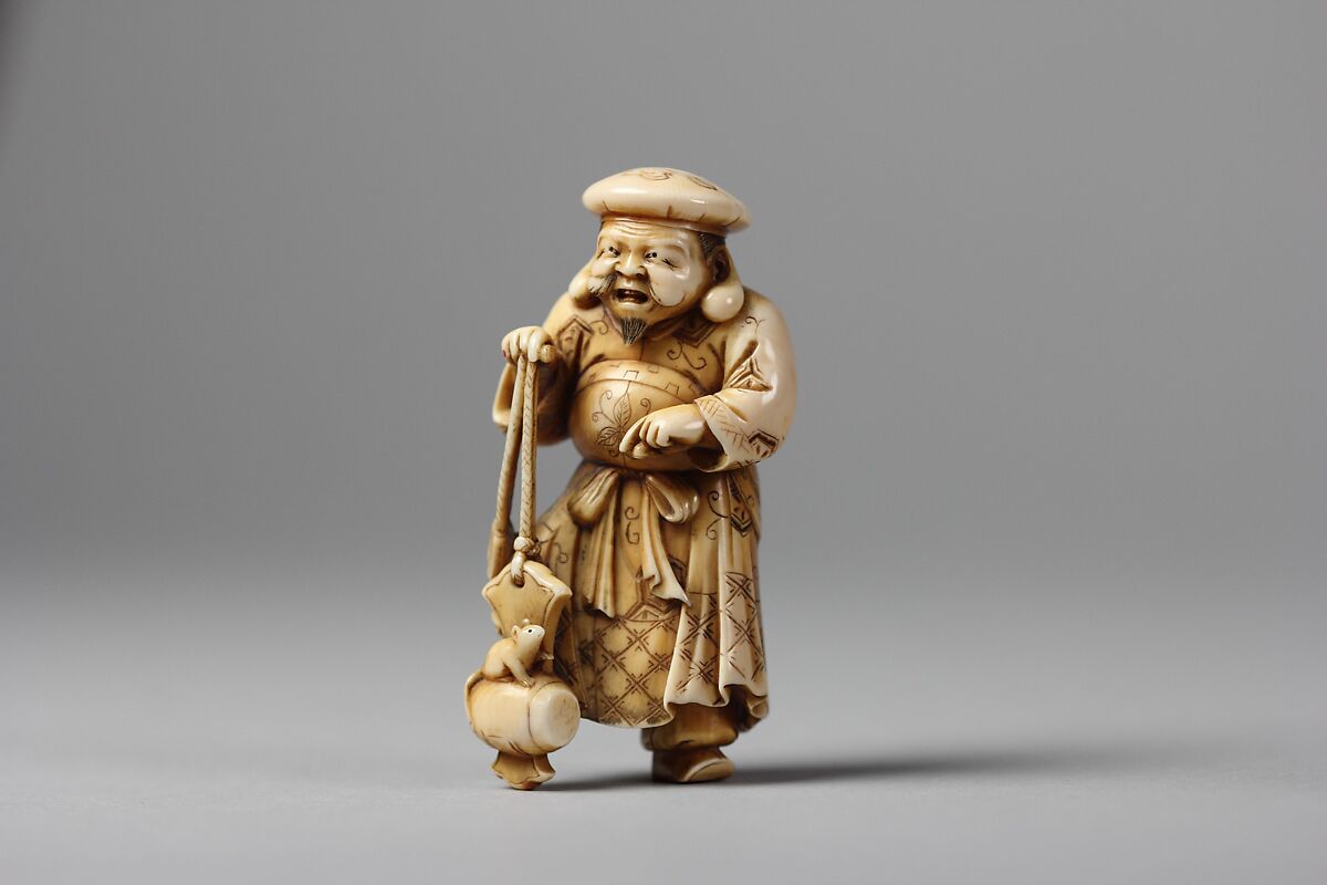 Netsuke of Figure of Daikoku with a Rat on His Mallet, Ivory, Japan
