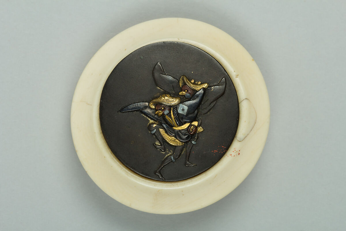 Netsuke of Two Tengu Dancing, Ivory with metal disc, Japan 