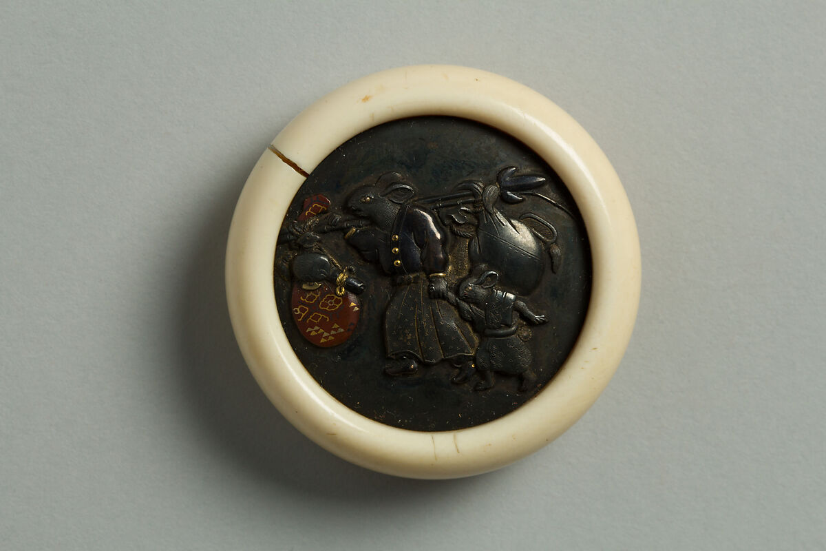 Netsuke of Mother Hare and Son Carrying the Emblem of the Gods of Luck, Ivory with metal disc, Japan 