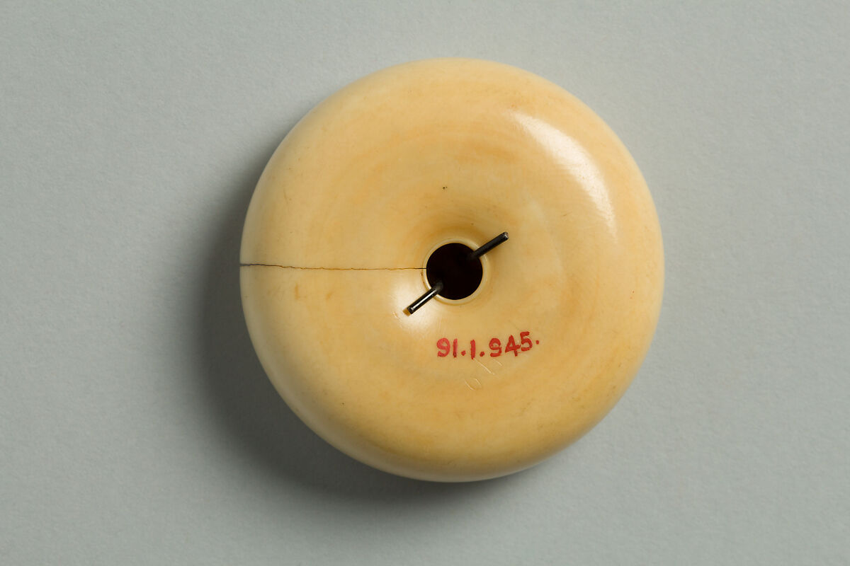 Netsuke of Mother Hare and Son Carrying the Emblem of the Gods of Luck, Ivory with metal disc, Japan