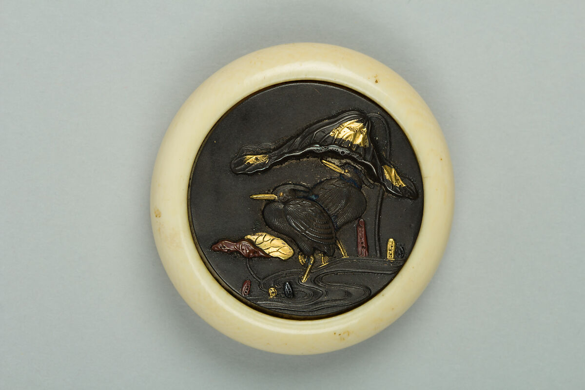 Netsuke of Cranes in a Lotus Pond, Ivory with metal disc, Japan 