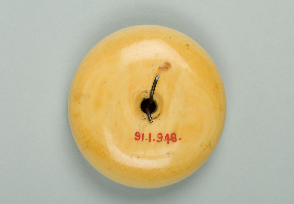 Netsuke of Cranes in a Lotus Pond, Ivory with metal disc, Japan