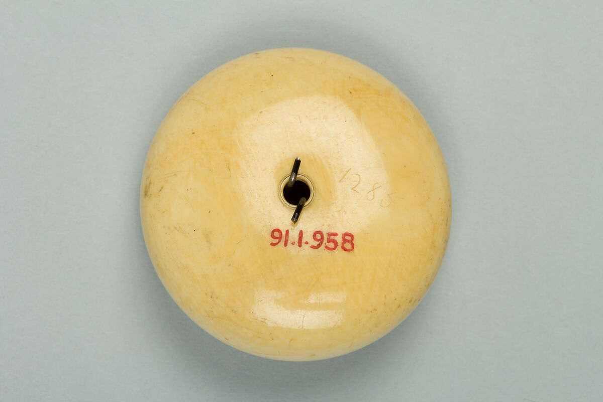 Netsuke of Sage with Big Nose, Ivory with metal disc, Japan