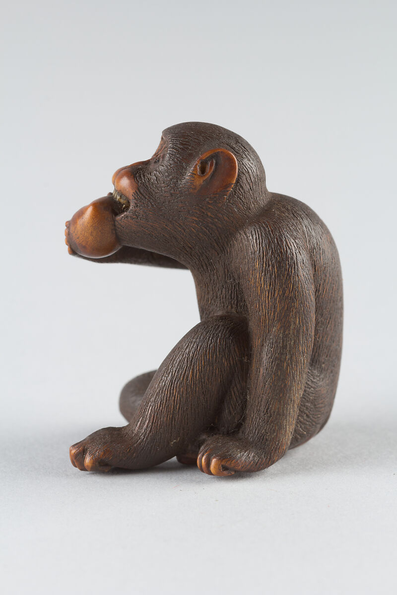 Netsuke of Monkey Eating a Peach, Wood, Japan