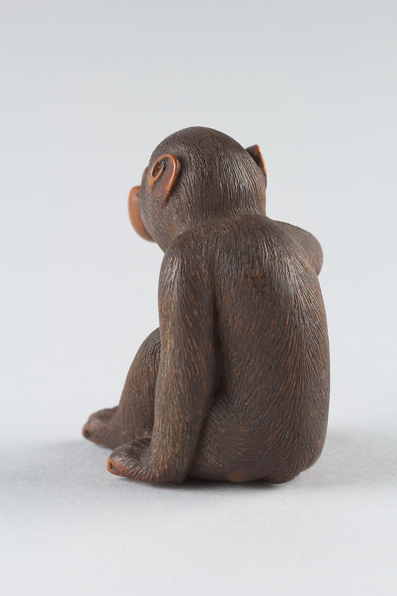 Netsuke of Monkey Eating a Peach, Wood, Japan