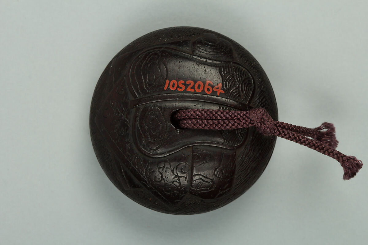 Netsuke, Wood inlaid with ivory, Japan