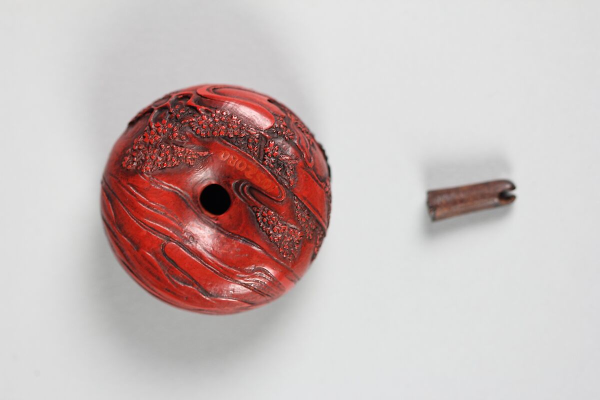Netsuke, Red lacquer with silver ornament, Japan
