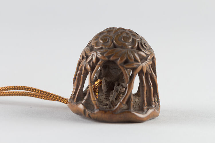 Netsuke of man in a bamboo grove