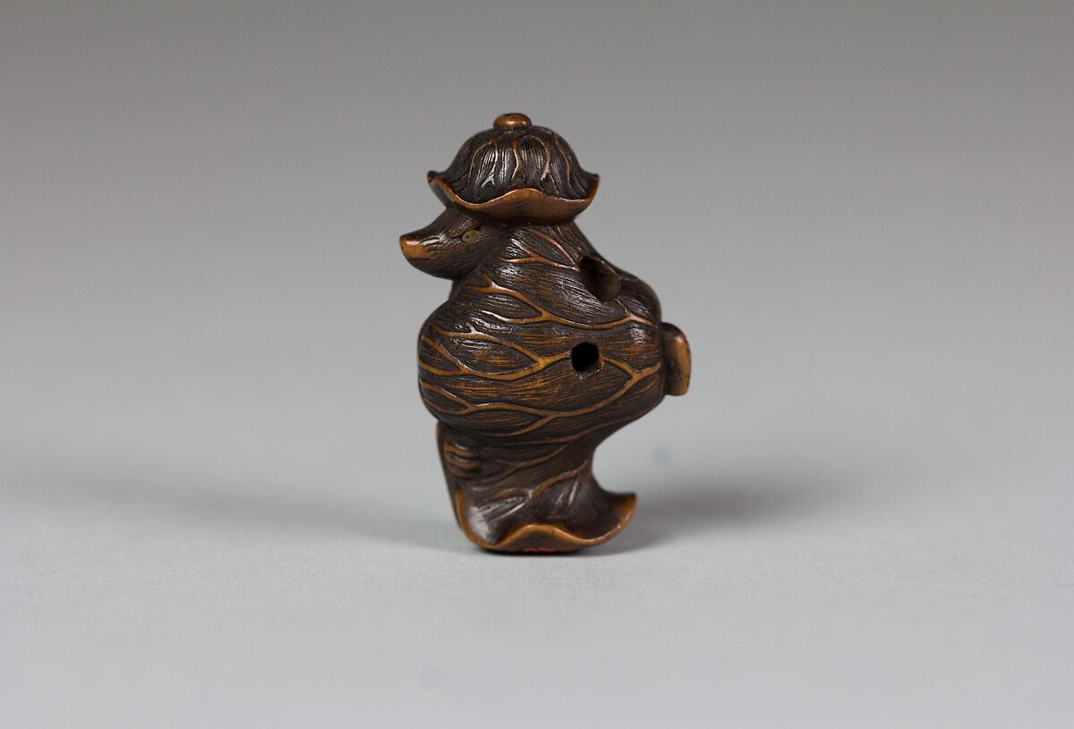 Tanuki in a Lotus Leaf, Matsuda Sukenaga (Japanese, 1800–1871), Wood, Japan
