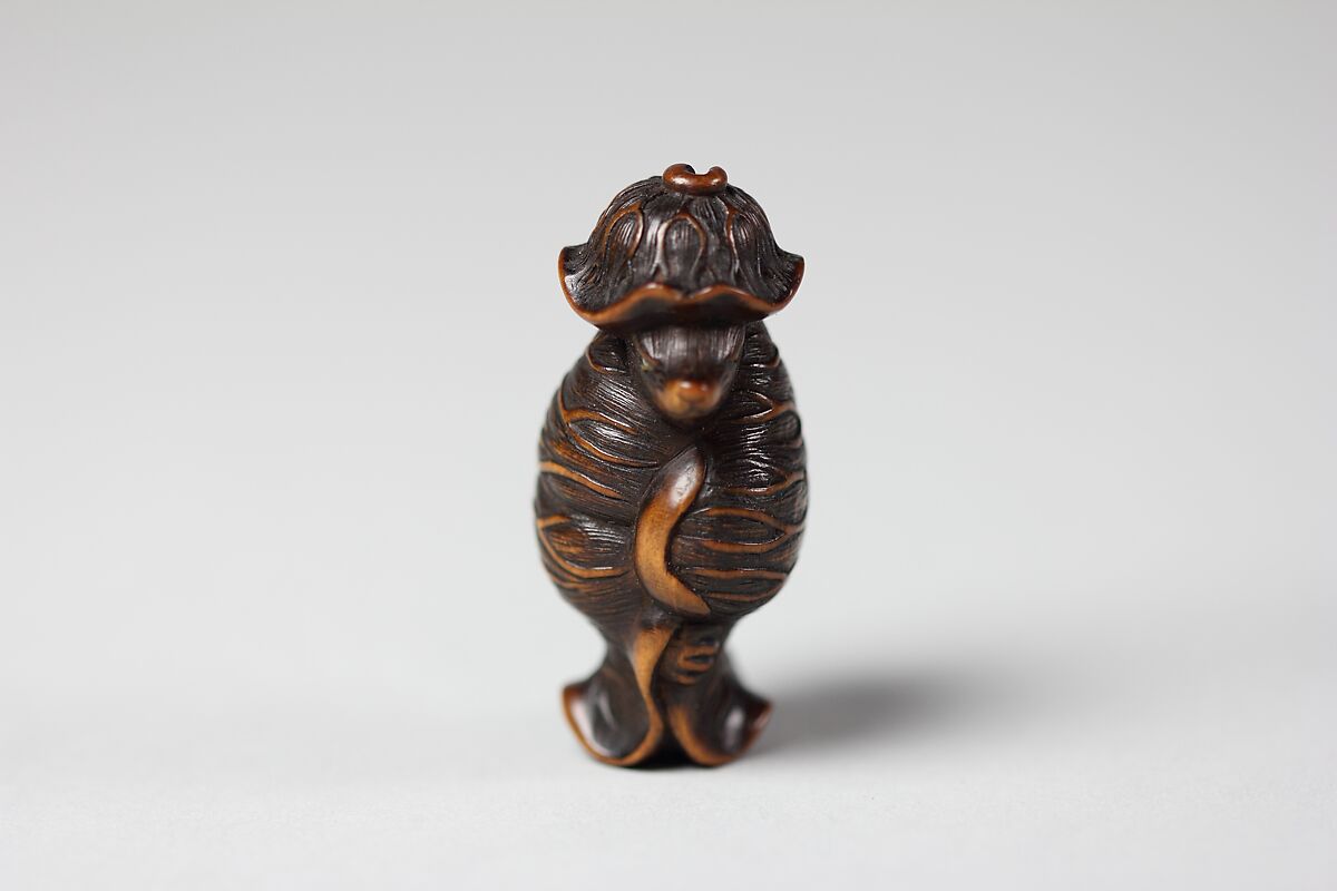 Tanuki in a Lotus Leaf, Matsuda Sukenaga (Japanese, 1800–1871), Wood, Japan